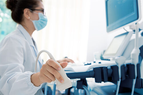 Medical Professional Using Ultrasound Machine